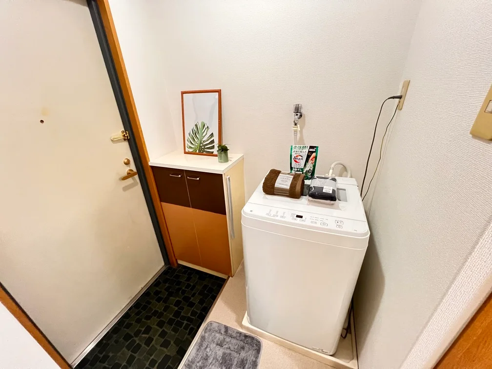 洗濯機はここですよ。