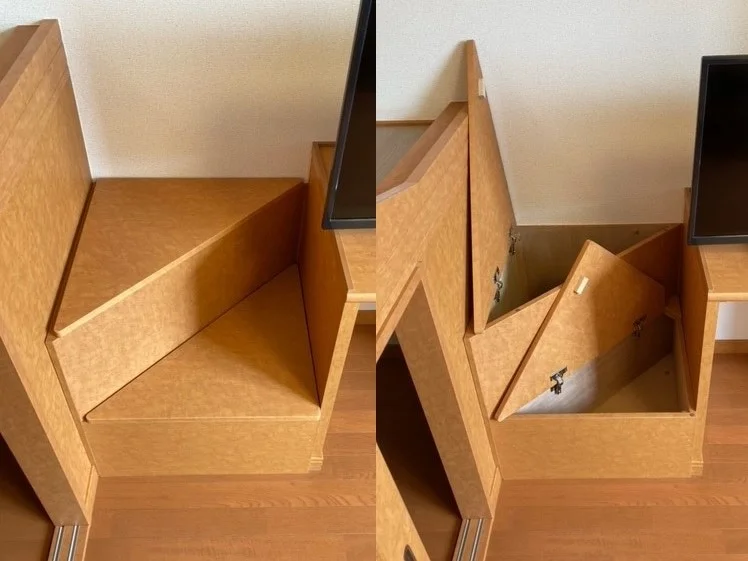 ベッド脇の階段は収納をかねております。
