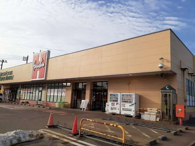 原信春日山店まで1100m