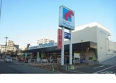 万代春日野道店様まで450m