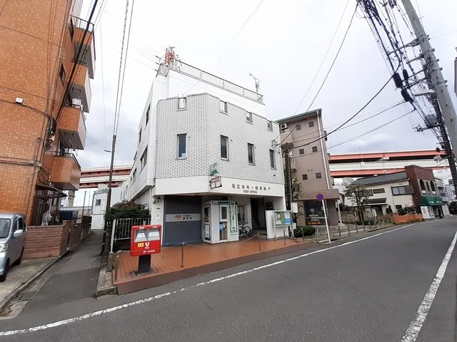 足立本木一郵便局まで500m