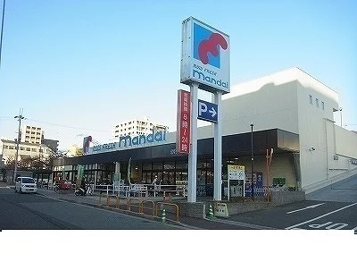 万代春日野道店様まで350m