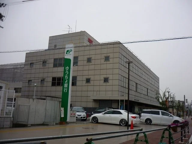 寝屋川郵便局まで950m