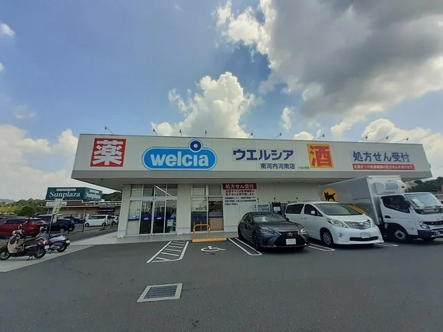 ウェルシア南河内河南店様まで877m