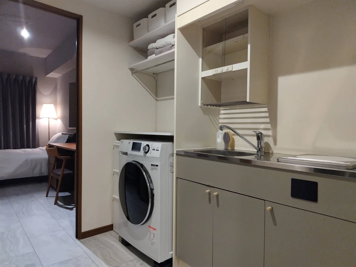 洗濯機置き場の収納充実