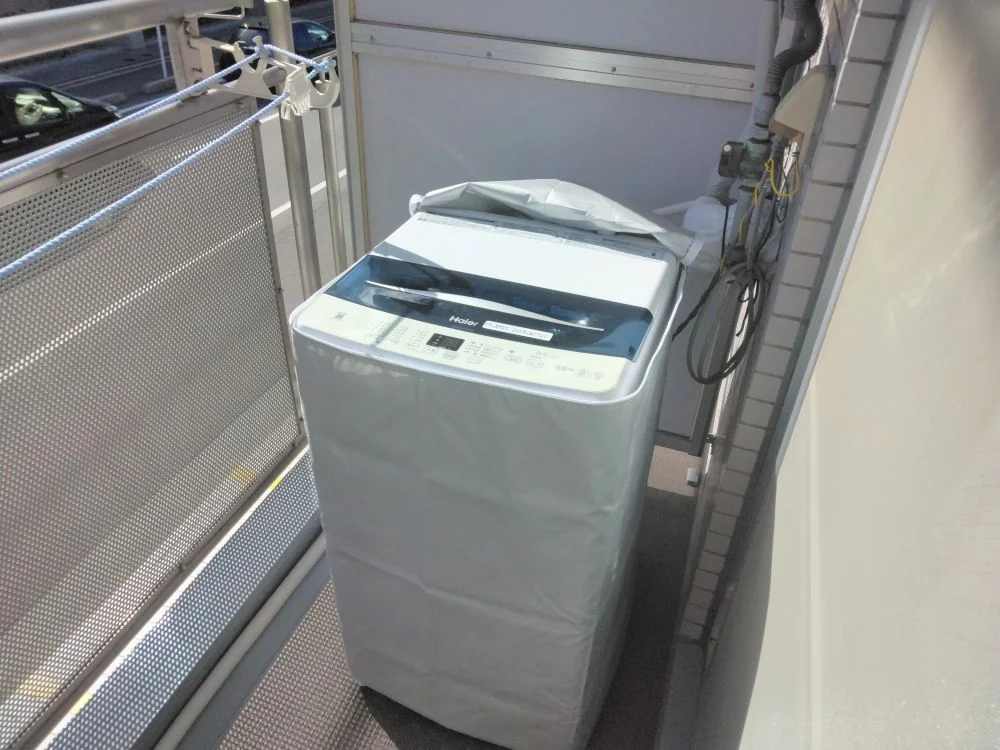 ベランダに洗濯機設置