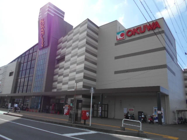 オークワロマンシティ店様まで220m