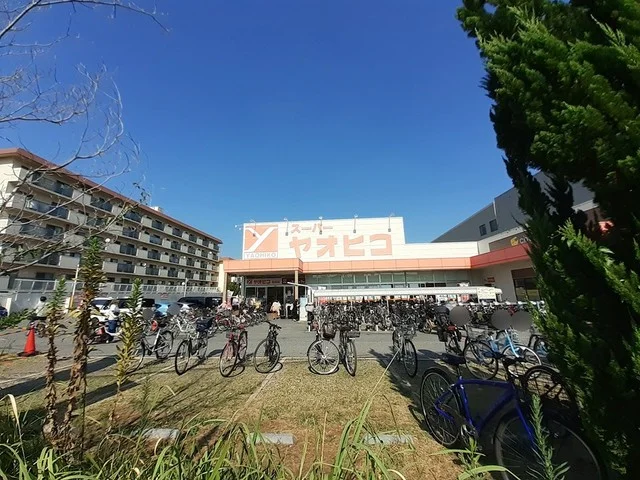 ヤオヒコ柏原店様まで560m