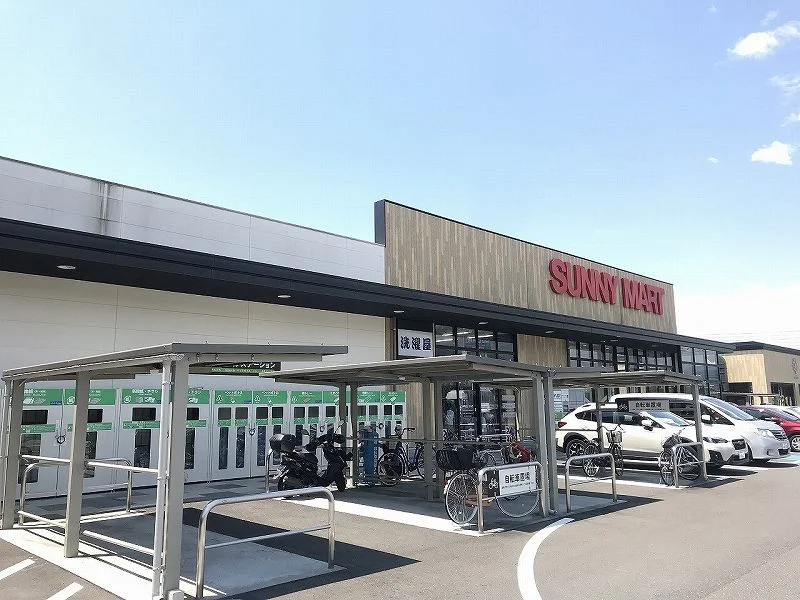 ニーマートとさのさと御座店まで1120メートル（徒歩14分）