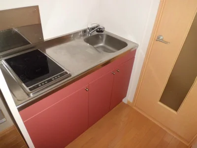 ２口電気コンロ付の台所流し台。