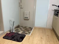 玄関部には傘立て、靴ベラをご用意しました。