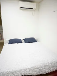 大きいベッドでゆっくりとおくつろぎいただけます