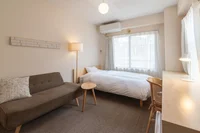 アースカラーを中心に、柔らかな色と素材で作られたお部屋。