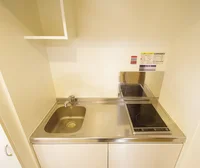 IH＆ラジエントヒーターの２口コンロ（※部屋により左右対称）