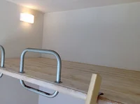 ロフトにいろいろなものが置けるので居間が広々と使えます。