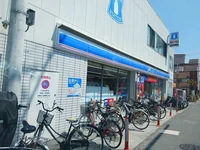 ローソン富田林西口駅店様まで633m