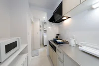 キッチンは広々としており、調理がしやすくなっています。