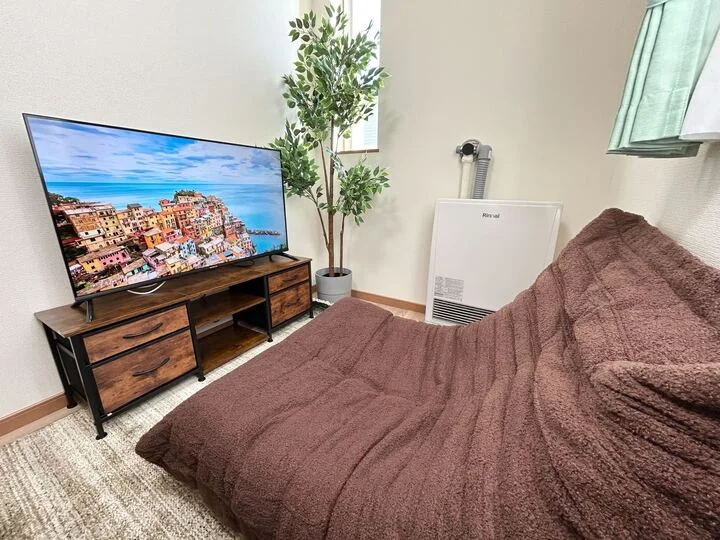 大きいソファーでゆっくりお寛ぎください