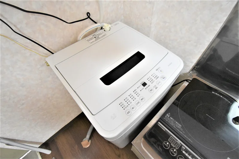 【洗濯機画像】ホテルと違い洗濯機がある生活は良いですね♪7日以上の利用なら富山市ウィークリーマンションをご利用下さい★洗濯洗剤も完備‼